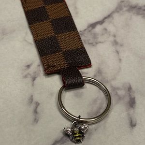 Louis Vuitton upcycled keychain with bee